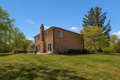 Set on a lush 1.4-acre parcel adjacent to Deerpath Golf Course - photo 36
