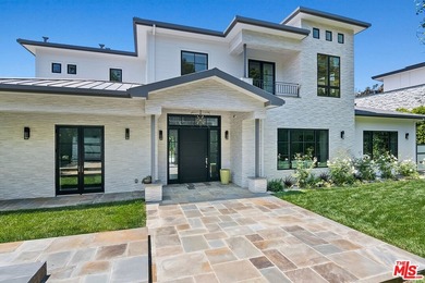 This meticulously crafted estate is located in the highly