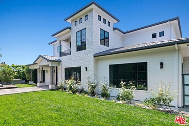 This meticulously crafted estate is located in the highly