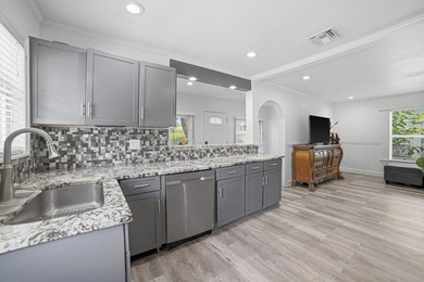 This charming single-family home, nestled in the heart of West - photo 11