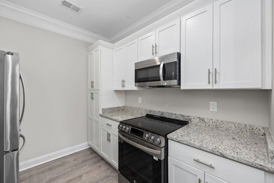 Indulge in coastal luxury with this stunning 3-bedroom - photo 11