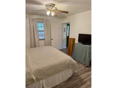 Looking for a lake getaway? This charming 3-bedroom, 1.5-bath - photo 20