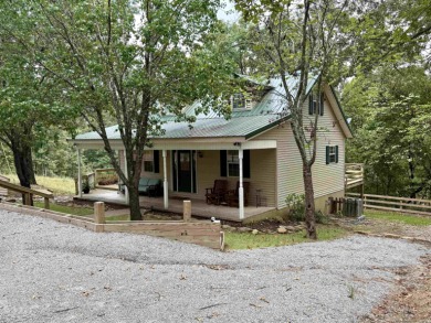 Looking for a lake getaway? This charming 3-bedroom, 1.5-bath - photo 35