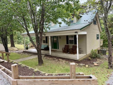 Looking for a lake getaway? This charming 3-bedroom, 1.5-bath - photo 38