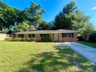Looking for your first home? This beautifully updated solid - photo 1