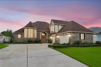 Welcome to this stunning English Tudor-style waterfront home in - photo 1