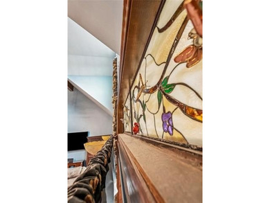 Welcome to this stunning English Tudor-style waterfront home in - photo 5