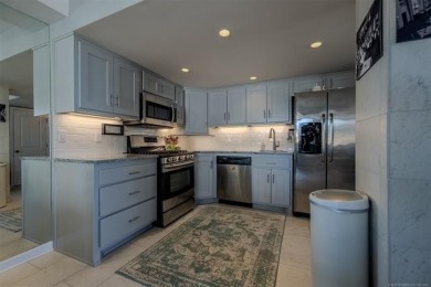 Experience sophisticated city living in this stunning updated