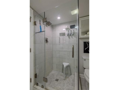 Experience sophisticated city living in this stunning updated