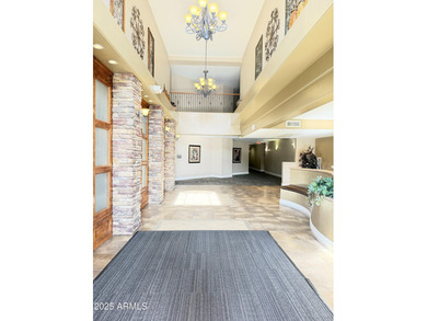 This move-in-ready residence offers refined resort-style living