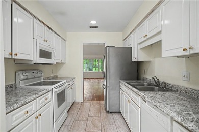 This end-unit townhome offers extra privacy and a practical - photo 9
