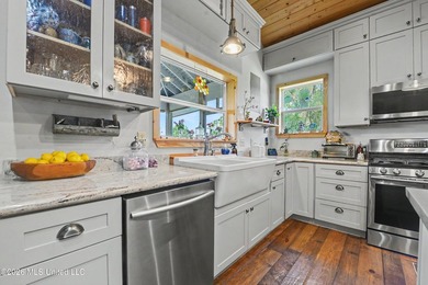 Welcome to this one-of-a-kind waterfront retreat where custom - photo 12
