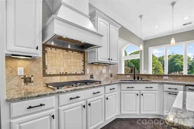 REFINED WATERFRONT LIVING AT IT'S BEST! Meticulously renovated - photo 22