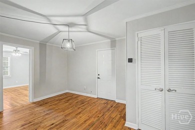 Step inside to discover gorgeous original hardwood floors - photo 8