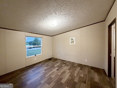 Come and check out this home minutes away from the lake at an - photo 11