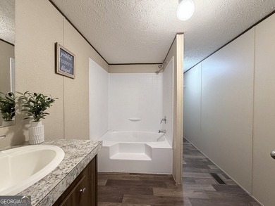 Come and check out this home minutes away from the lake at an - photo 12