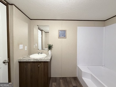 Come and check out this home minutes away from the lake at an - photo 13