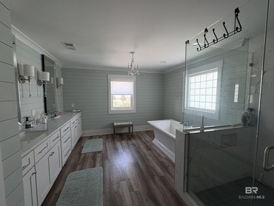 This custom waterfront home is located in the most convenient - photo 15