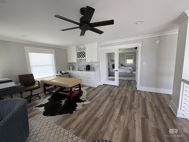 This custom waterfront home is located in the most convenient - photo 17