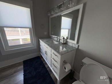 This custom waterfront home is located in the most convenient - photo 24