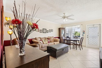 Corner, 2nd floor, walk up unit with a Balcony overlooking Water - photo 1
