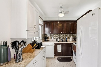 Corner, 2nd floor, walk up unit with a Balcony overlooking Water - photo 2