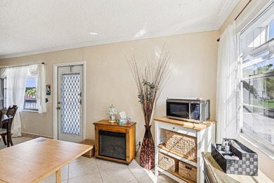 Corner, 2nd floor, walk up unit with a Balcony overlooking Water - photo 9