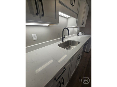 Completed remodel, granite and stainless, new wood style floors - photo 8