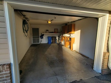 One-bedroom condo with an attached one car garage, outside - photo 24