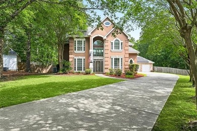 Beautifully maintained home featuring rich hardwood flooring - photo 1