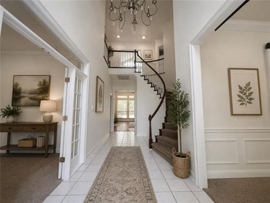Beautifully maintained home featuring rich hardwood flooring - photo 3