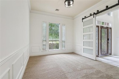 Beautifully maintained home featuring rich hardwood flooring - photo 5