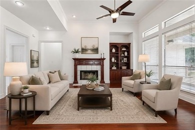 Beautifully maintained home featuring rich hardwood flooring - photo 6