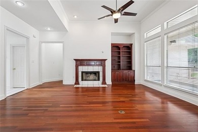Beautifully maintained home featuring rich hardwood flooring - photo 7
