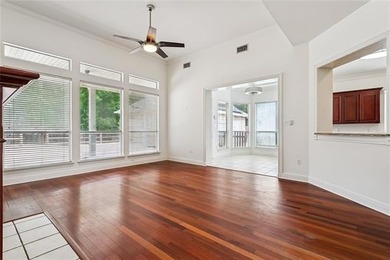 Beautifully maintained home featuring rich hardwood flooring - photo 8