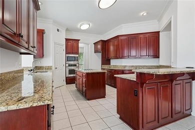 Beautifully maintained home featuring rich hardwood flooring - photo 9