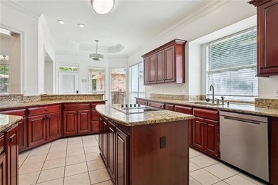 Beautifully maintained home featuring rich hardwood flooring - photo 10