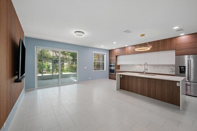 Wow! 180K in upgrades on this beautiful 4-bedroom, 3-bath home - photo 4