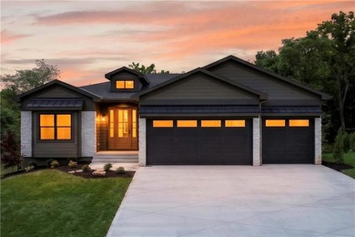 Nestled on a private, wooded estate lot at the end of a quiet - photo 1