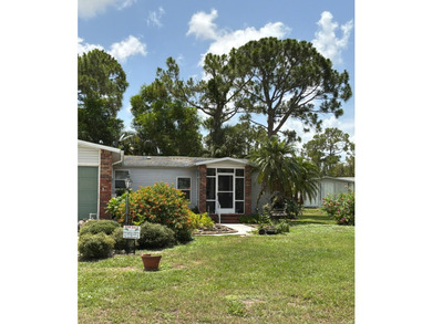 Welcome home to this warm and inviting residence, nestled on a - photo 2