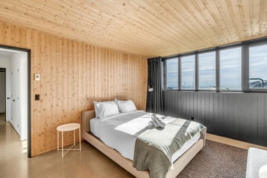 Les Rorquals. Cette maison de style rustique, aux lignes epurees - photo 50