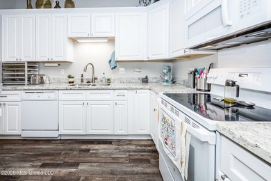 Tucked away in a charming coastal town, this 4-bedroom, 2-bath - photo 11