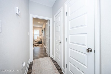 Tucked away in a charming coastal town, this 4-bedroom, 2-bath - photo 12