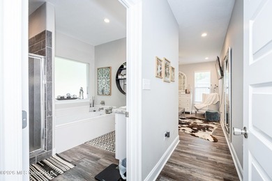 Tucked away in a charming coastal town, this 4-bedroom, 2-bath - photo 13