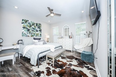 Tucked away in a charming coastal town, this 4-bedroom, 2-bath - photo 14