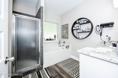 Tucked away in a charming coastal town, this 4-bedroom, 2-bath - photo 16