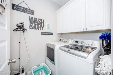Tucked away in a charming coastal town, this 4-bedroom, 2-bath - photo 21