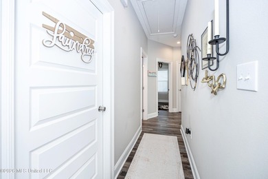 Tucked away in a charming coastal town, this 4-bedroom, 2-bath - photo 22