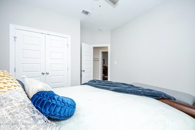 Tucked away in a charming coastal town, this 4-bedroom, 2-bath - photo 25