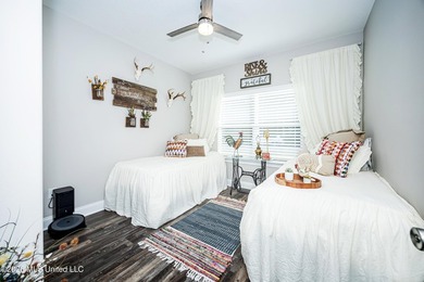 Tucked away in a charming coastal town, this 4-bedroom, 2-bath - photo 26
